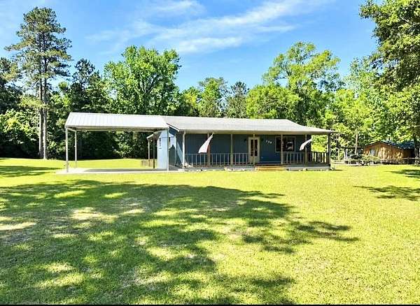 1.55 Acres of Land with Home for Sale in Brookeland, Texas