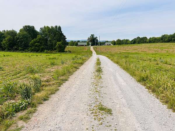 57.3 Acres of Agricultural Land with Home for Sale in Morrison, Tennessee