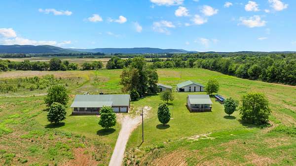 57.3 Acres of Agricultural Land with Home for Sale in Morrison, Tennessee
