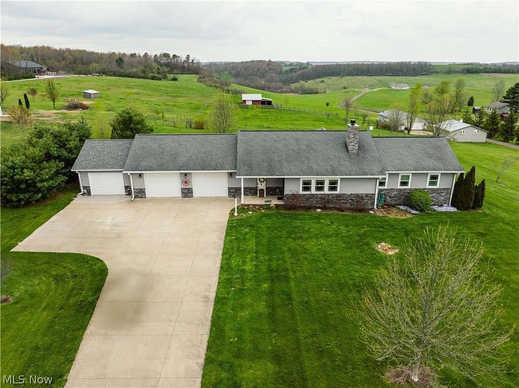 9.79 Acres of Land with Home for Auction in Dundee, Ohio