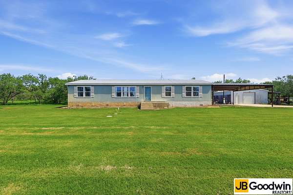 11.1 Acres of Recreational Land with Home for Sale in Jourdanton, Texas
