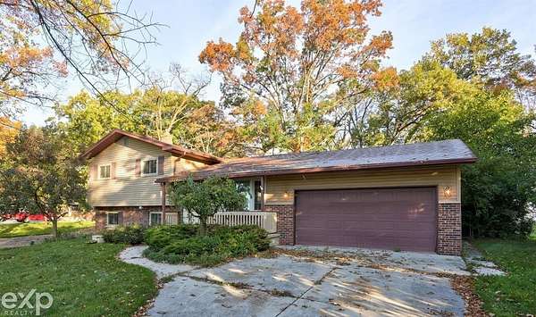 1.5 Acres of Land with Home for Sale in Essexville, Michigan