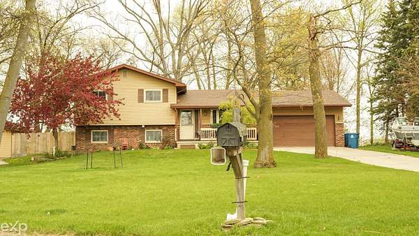 1.5 Acres of Land with Home for Sale in Essexville, Michigan