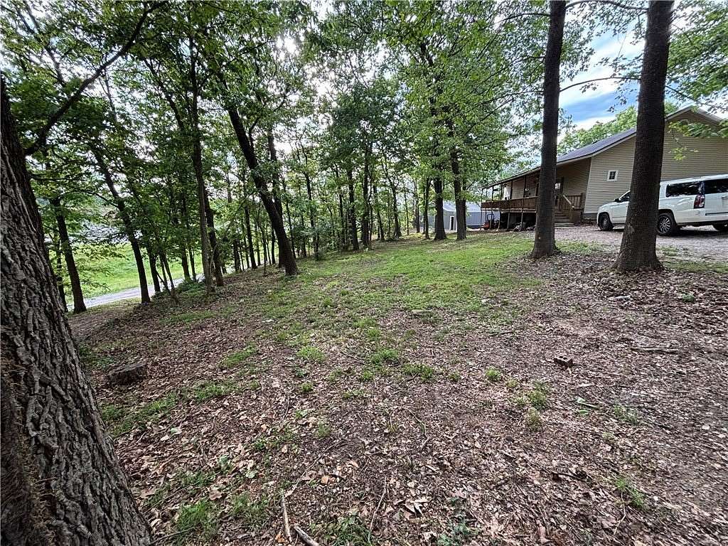 2 Acres of Land with Home for Sale in Gravette, Arkansas