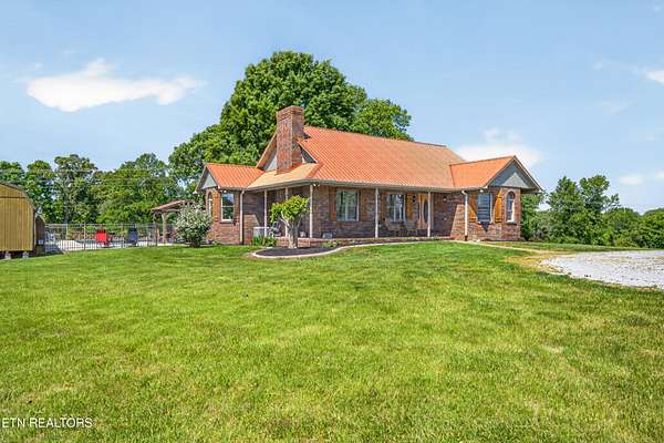 15.6 Acres of Land with Home for Sale in Baxter, Tennessee