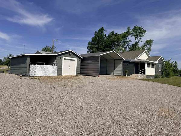 6.4 Acres of Land with Home for Sale in Adamsville, Tennessee