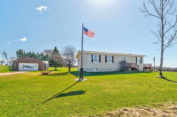 40 Acres of Land with Home for Sale in McMillan, Michigan