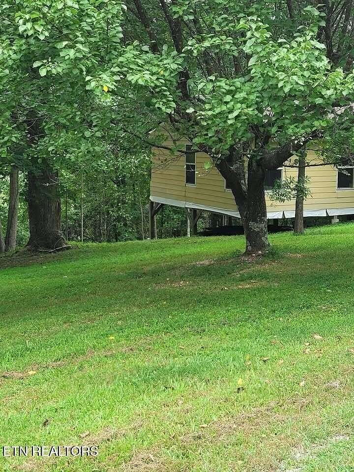 5.34 Acres of Land with Home for Auction in Hilham, Tennessee