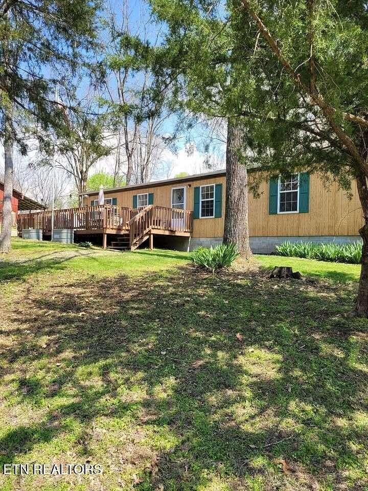 13.7 Acres of Land with Home for Auction in Hilham, Tennessee