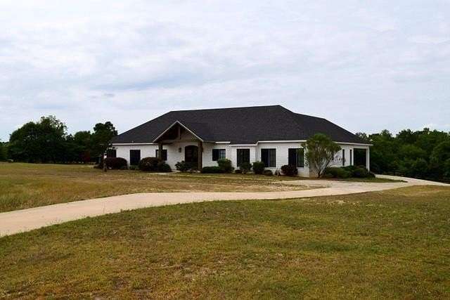 14.1 Acres of Land with Home for Sale in Headland, Alabama