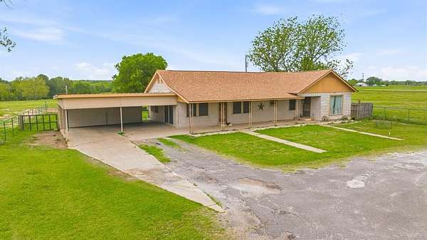 25.8 Acres of Agricultural Land with Home for Sale in De Leon, Texas