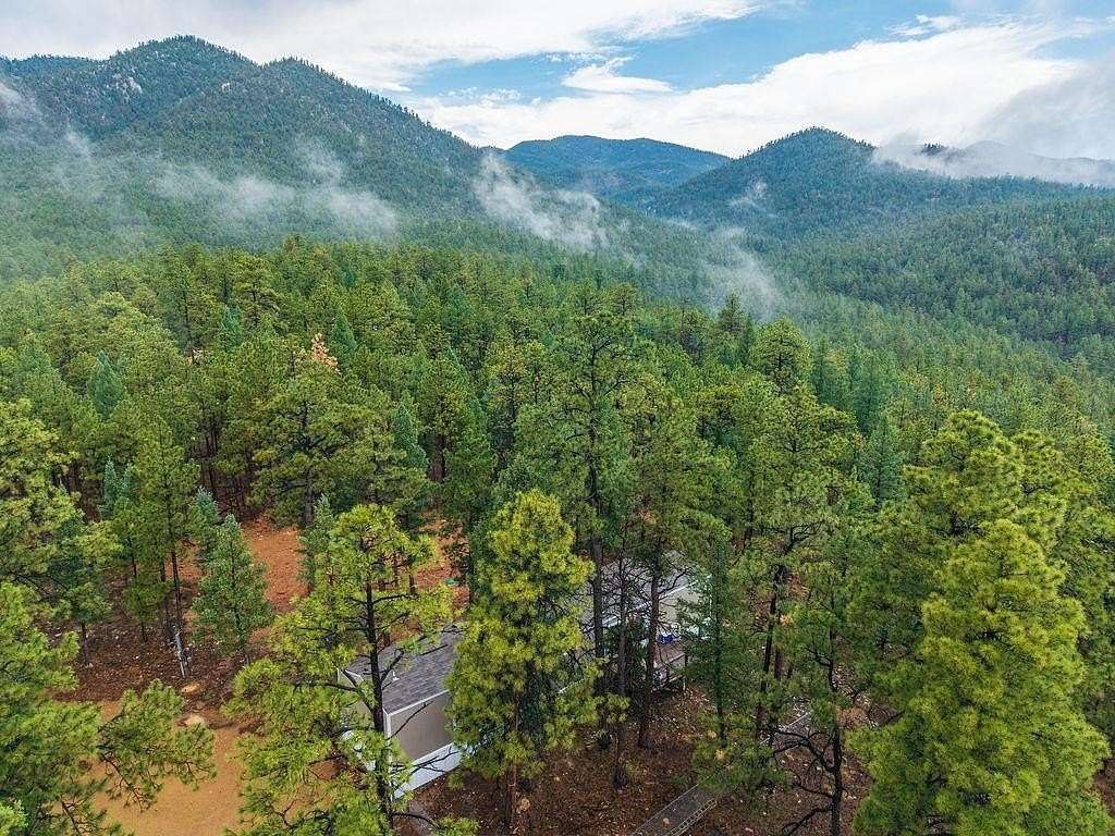 7.8 Acres of Land with Home for Sale in Guadalupita, New Mexico