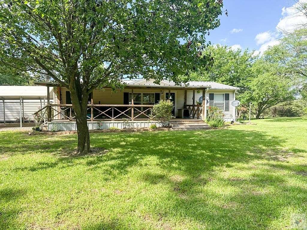 2 Acres of Land with Home for Sale in Avery, Texas