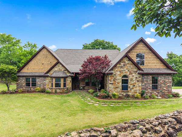 6.14 Acres of Land with Home for Sale in Mena, Arkansas