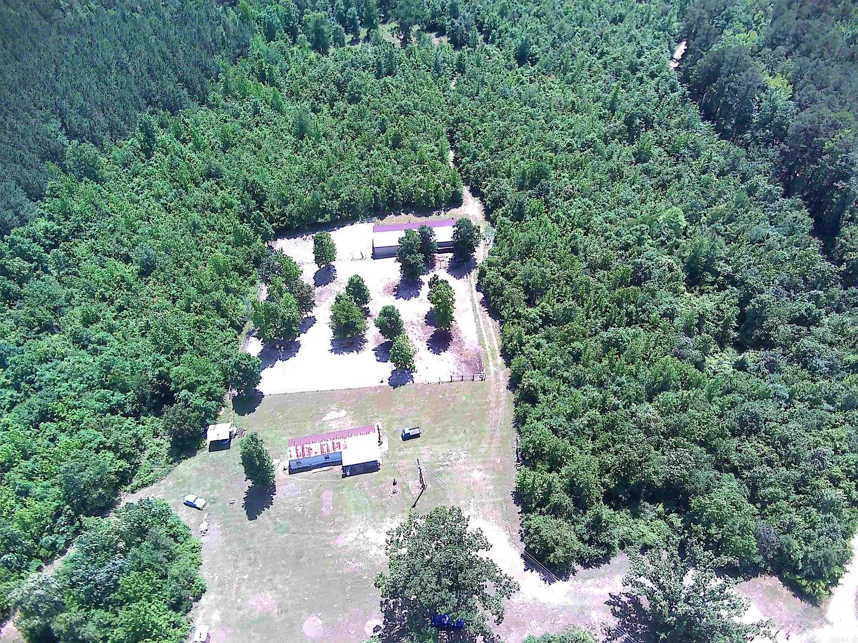 7.78 Acres of Land with Home for Sale in Amity, Arkansas
