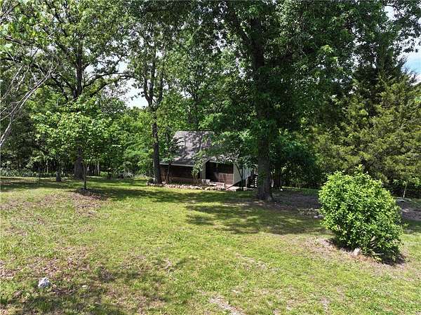 6.8 Acres of Land with Home for Sale in Pineville, Missouri