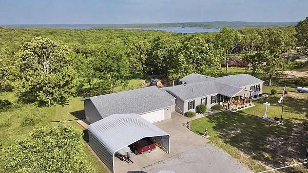 2 Acres of Land with Home for Sale in Wheatland, Missouri