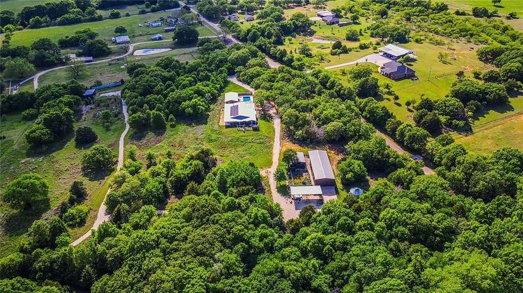 88.2 Acres of Land with Home for Sale in Grandview, Texas