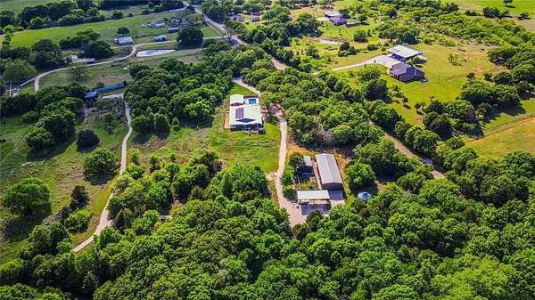 88.2 Acres of Land with Home for Sale in Grandview, Texas