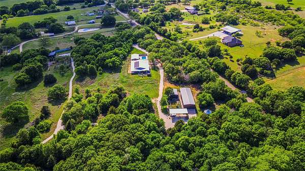 88.2 Acres of Land with Home for Sale in Grandview, Texas