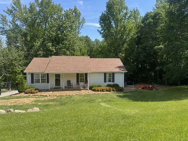 1.5 Acres of Land with Home for Sale in Palmyra, Tennessee