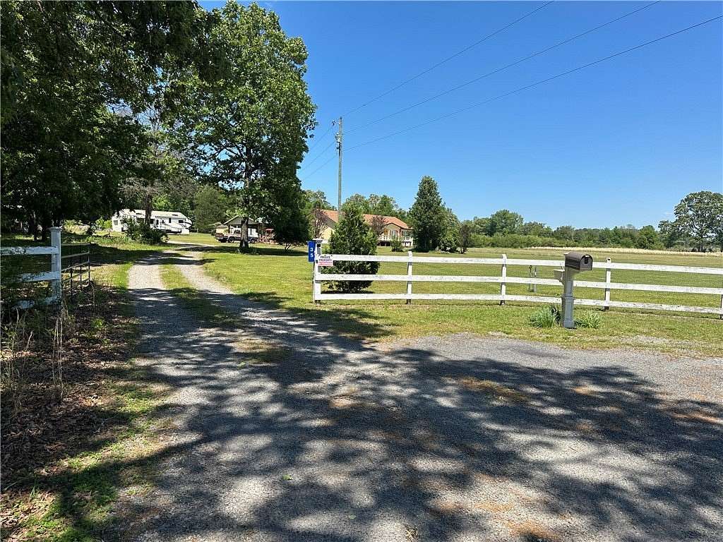 13 Acres of Land with Home for Sale in Clayton Township, Arkansas