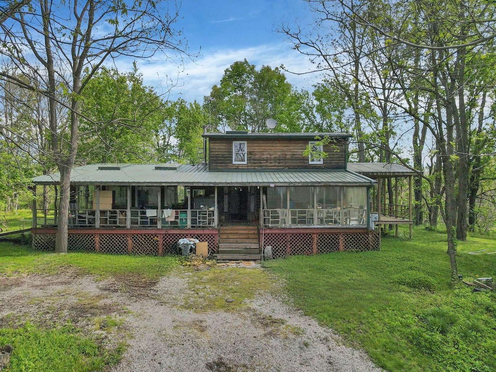 10 Acres of Recreational Land with Home for Sale in Glouster, Ohio