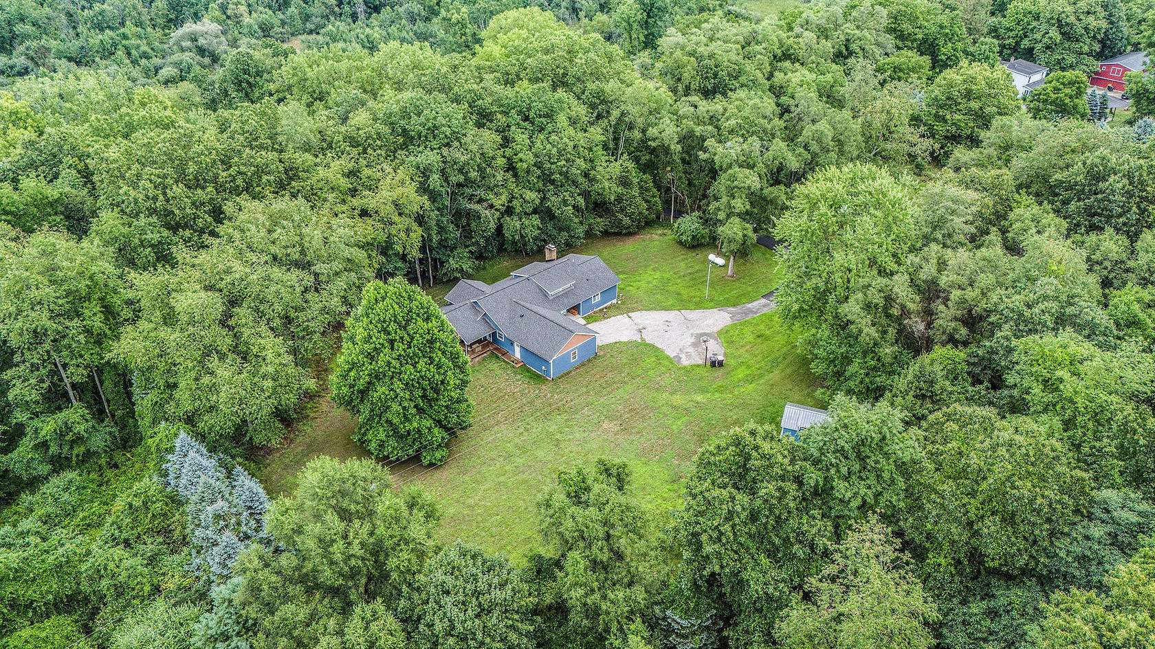 4.65 Acres of Land with Home for Sale in Ada, Michigan