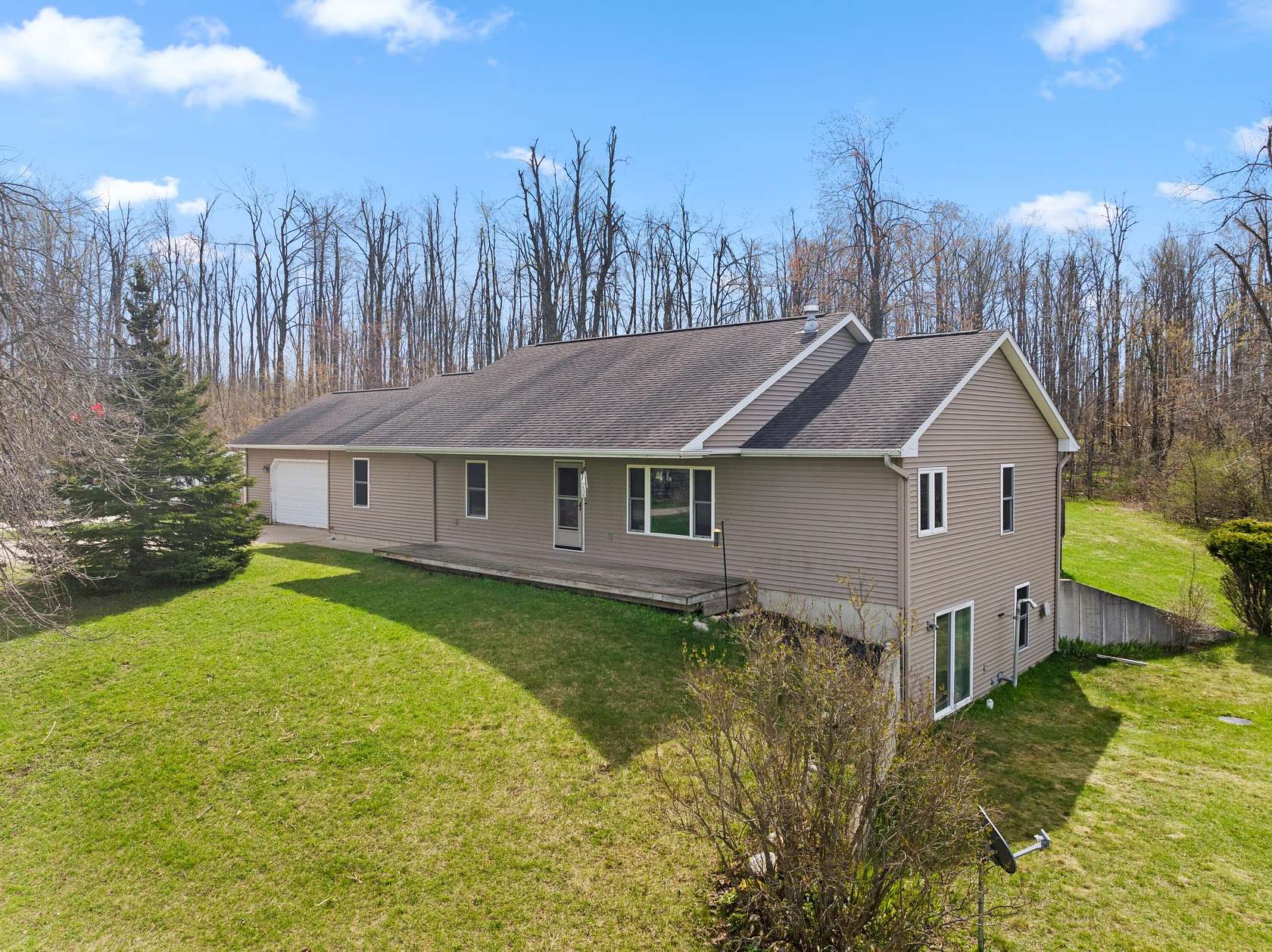 10 Acres of Land with Home for Sale in Elmira, Michigan