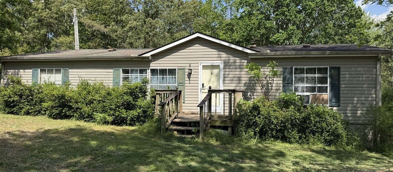 5.2 Acres of Land with Home for Auction in Cedar Hill, Tennessee