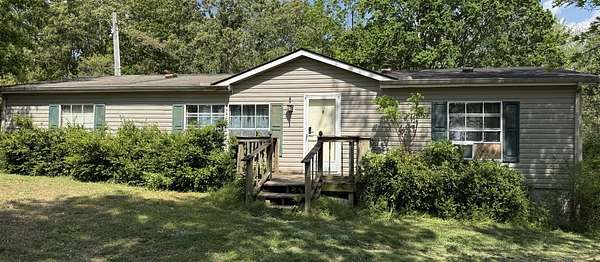 5.2 Acres of Land with Home for Auction in Cedar Hill, Tennessee