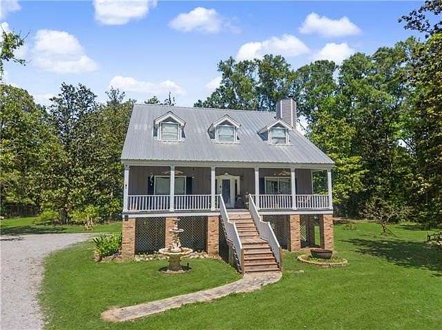 11.2 Acres of Land with Home for Sale in Covington, Louisiana