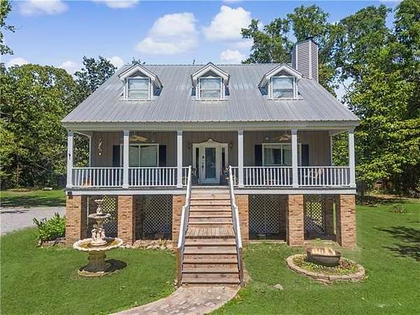 11.2 Acres of Land with Home for Sale in Covington, Louisiana