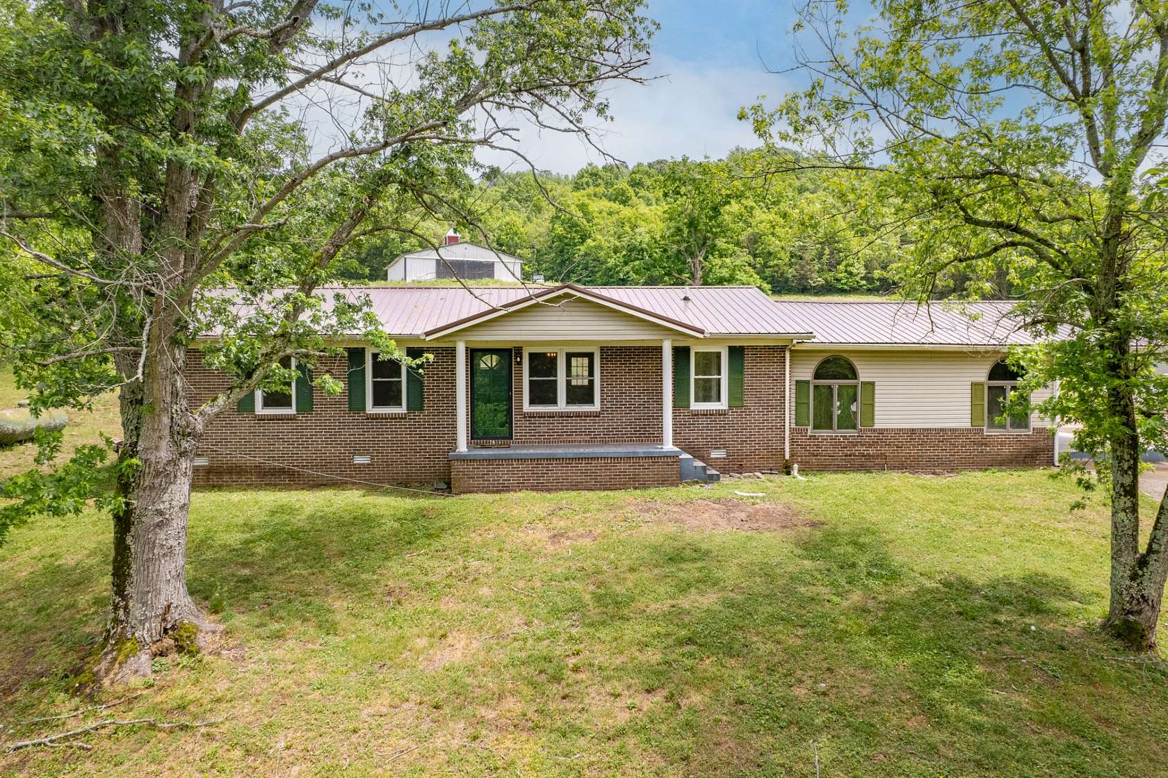 6.79 Acres of Land with Home for Sale in Hampshire, Tennessee