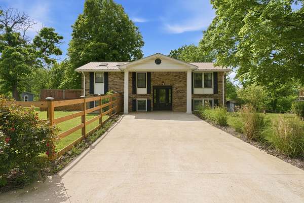 6.5 Acres of Land with Home for Sale in Lyles, Tennessee