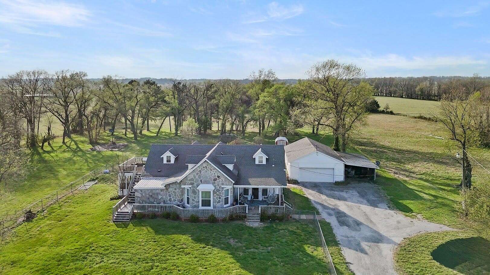 11.3 Acres of Land with Home for Sale in Cassville, Missouri