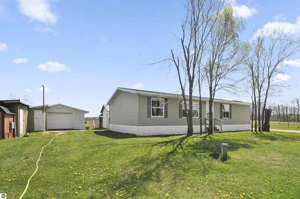 4.24 Acres of Land with Home for Sale in Evart, Michigan