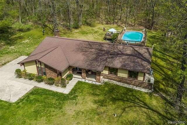 3.23 Acres of Land with Home for Sale in Springfield Township, Michigan