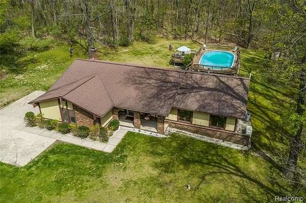 3.23 Acres of Land with Home for Sale in Springfield Township, Michigan