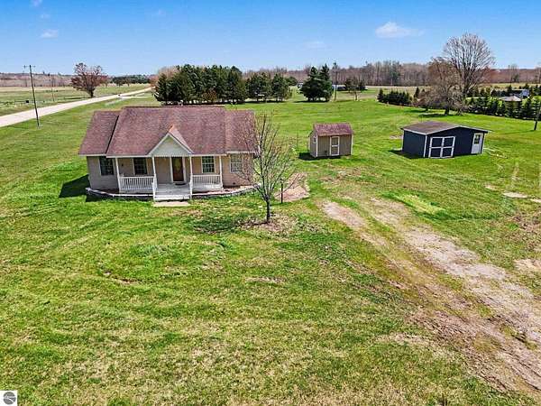 2 Acres of Land with Home for Sale in Lake City, Michigan
