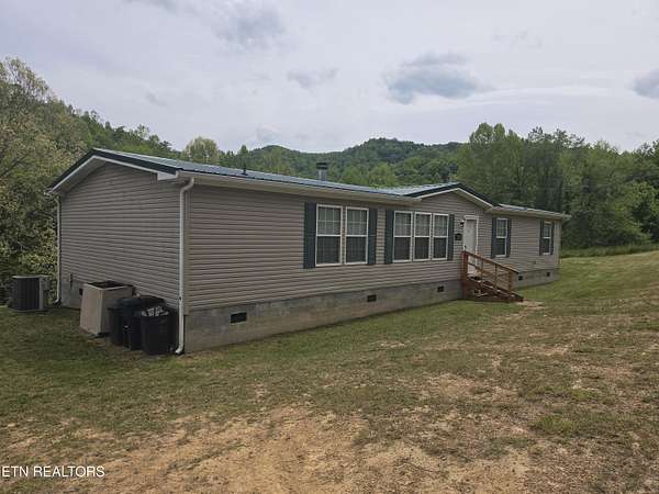 5.5 Acres of Land with Home for Sale in Pineville, Kentucky