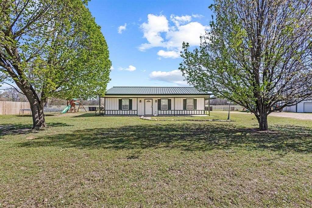 2 Acres of Land with Home for Sale in Blossom, Texas