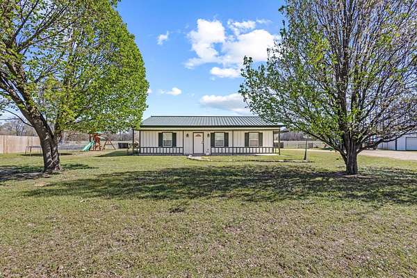 2 Acres of Land with Home for Sale in Blossom, Texas