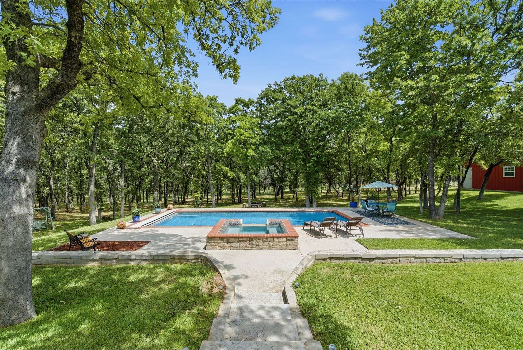 21.6 Acres of Recreational Land with Home for Sale in Poolville, Texas