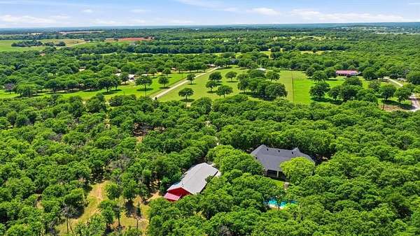 21.6 Acres of Land with Home for Sale in Poolville, Texas