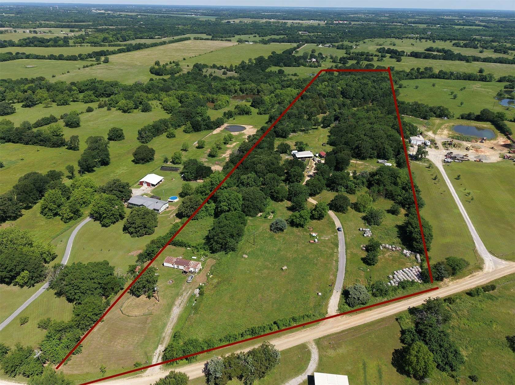 21.3 Acres of Recreational Land with Home for Sale in Whitewright, Texas