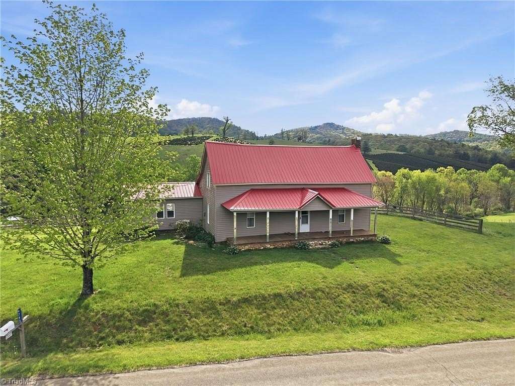 6.8 Acres of Land with Home for Sale in Laurel Springs, North Carolina