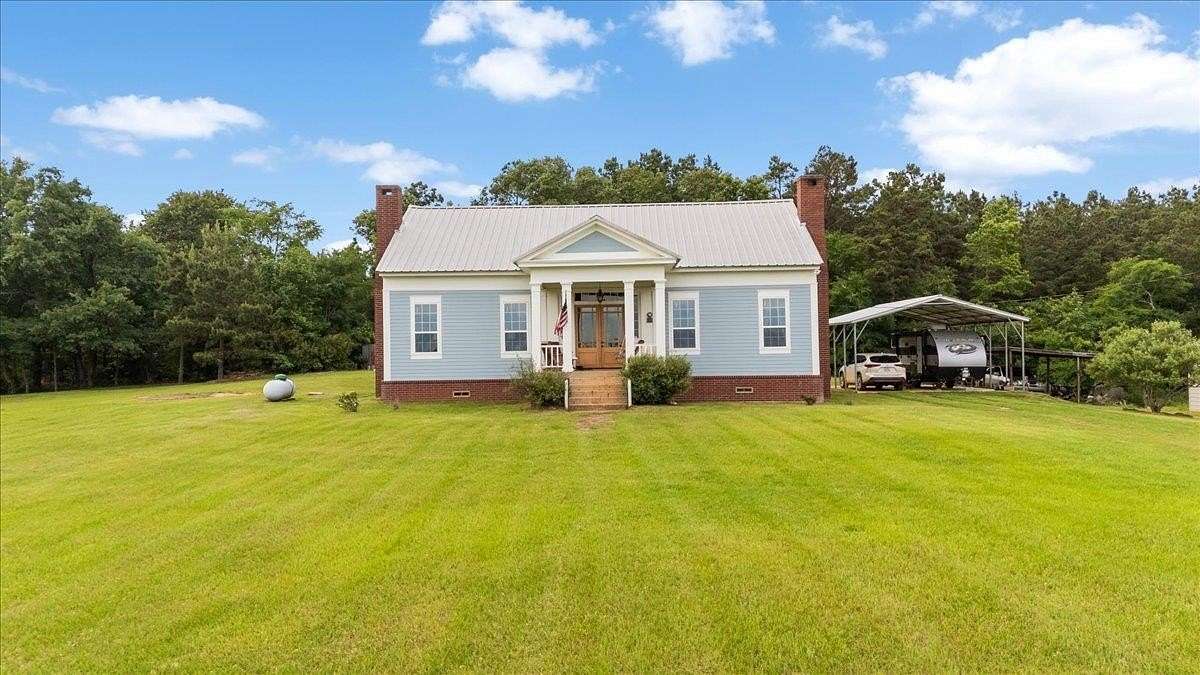 48 Acres of Recreational Land with Home for Sale in Cushing, Texas