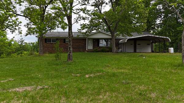 21.9 Acres of Land with Home for Sale in Bethel Springs, Tennessee