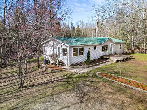 8 Acres of Land with Home for Sale in Alanson, Michigan